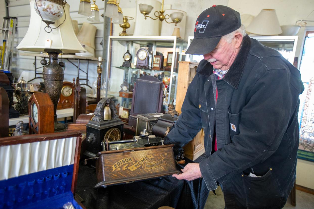 Jeffrey A. Lipman, owner of Red Barn Antiques, LLC, talks about an Edison Home Phonograph in his collection at Red Barn Antiques, LLC in New Egypt, NJ Monday, December 4, 2023.