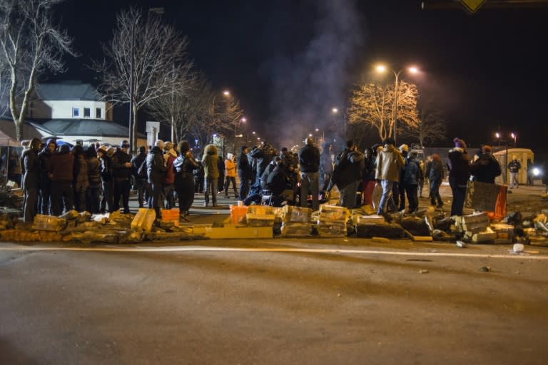 A group gathers outside of the 4th Precinct Police Station after five people were shot at a Black Lives Matters protest on November 24, 2015 in Minneapolis, Minnesota