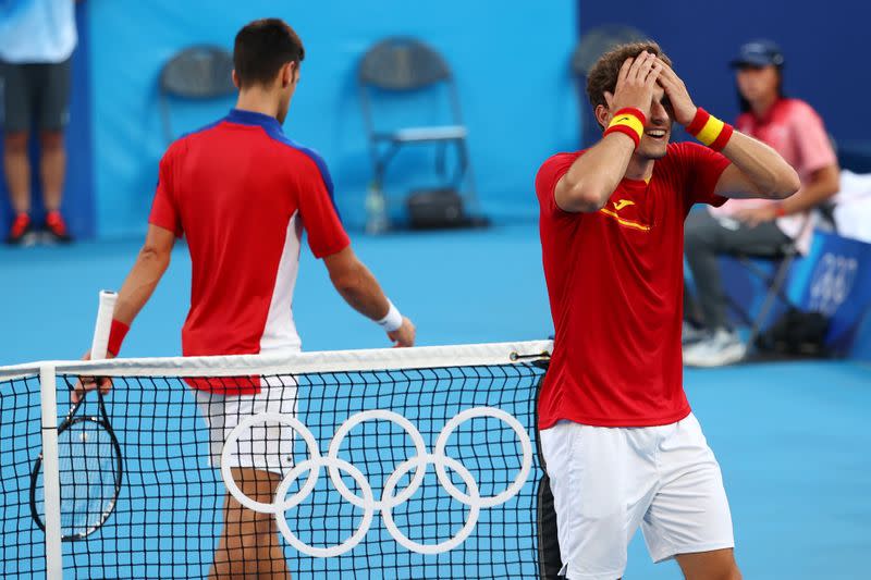 Foto del sábado del tenista español Pablo Carreño Busta celebrando tras ganar la medalla de bronce en los Juegos de Tokio