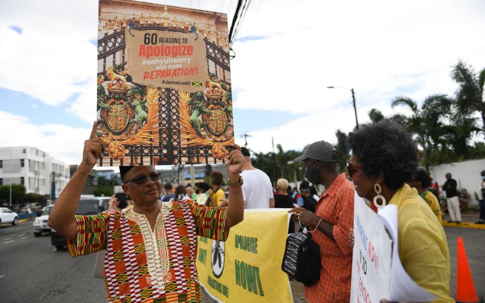 Protesters listed 60 reasons for 'apologies and reparations' from the UK and the Royal family during the visit of the Duke and Duchess of Cambridge to Jamaica - RICARDO MAKYN/AFP