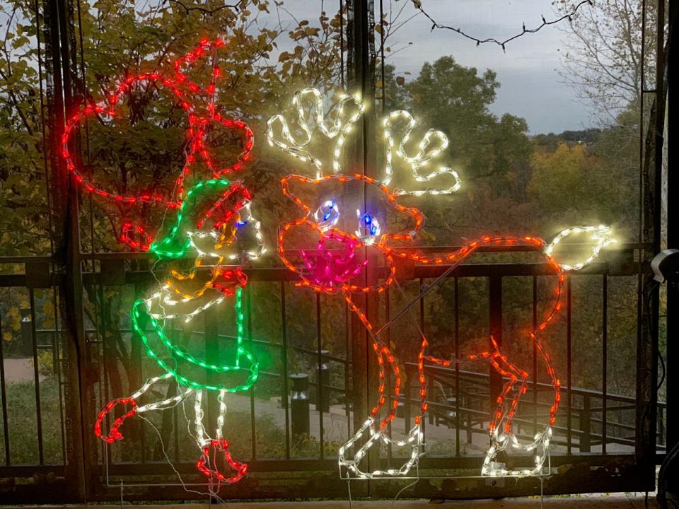 The newest ElectriCritter display is an elf kissing a reindeer. There are 194 displays spread over River Bend Nature Center.