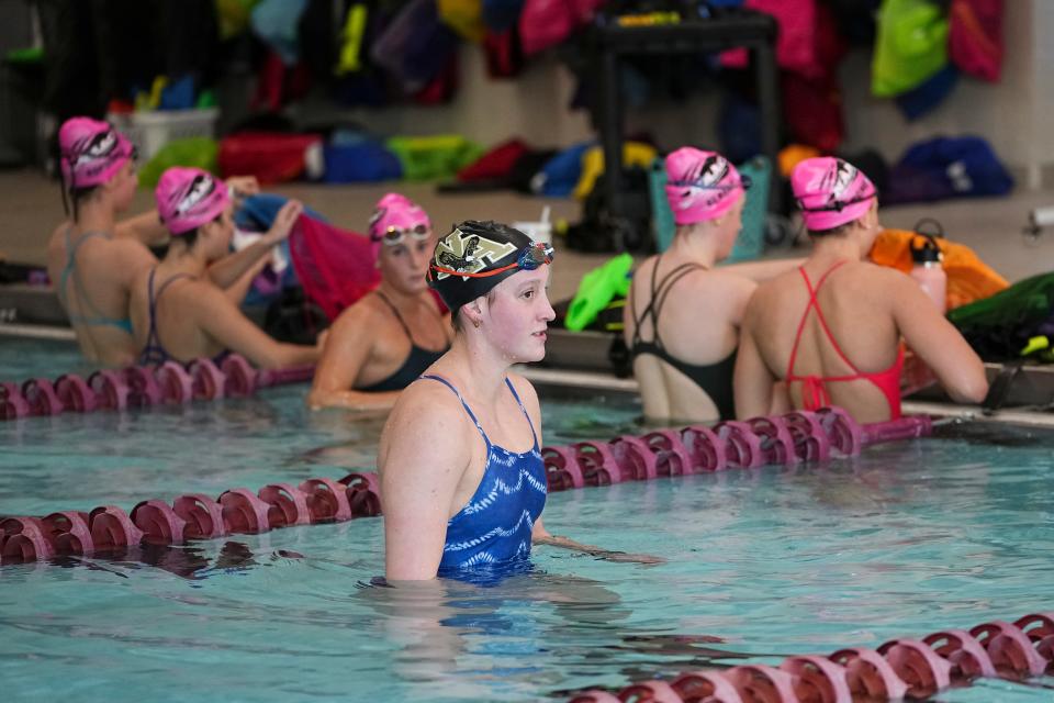 New Albany senior Ashlyn Morr, an Auburn signee and freestyle specialist, is one of countless high school swimmers who have embraced the advancements in swimsuit technology.