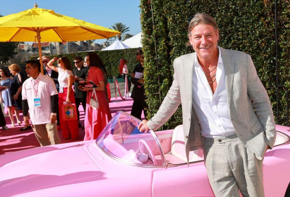 ty pennington and a pink car on the barbie red carpet