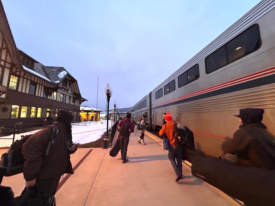 An Amtrak train sits at the train depot in Whitefish, Montana, on an early morning in January.