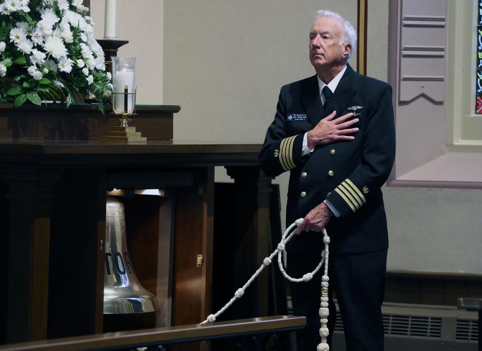 Captain Patrick Beard rings the Octorara and Brotherhood Bell during the Great Lakes Memorial Service on Nov. 14, 2021, at Mariner's Church. The memorial service remembers the lives lost in the roughly 6,000 shipwrecks in lakes Superior, Michigan, Huron, Erie and Ontario.