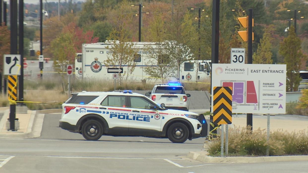 Durham Regional Police cruisers are shown here outside the casino last month where the fatal shooting occurred.  (Mehrdad Nazarahari/CBC - image credit)