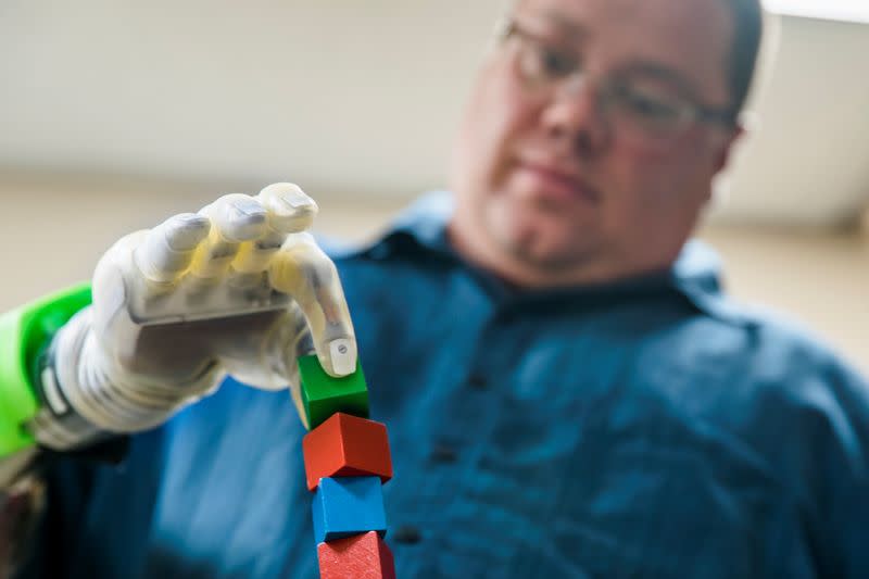 Joe Hamilton intuitively controls a DEKA prosthetic hand