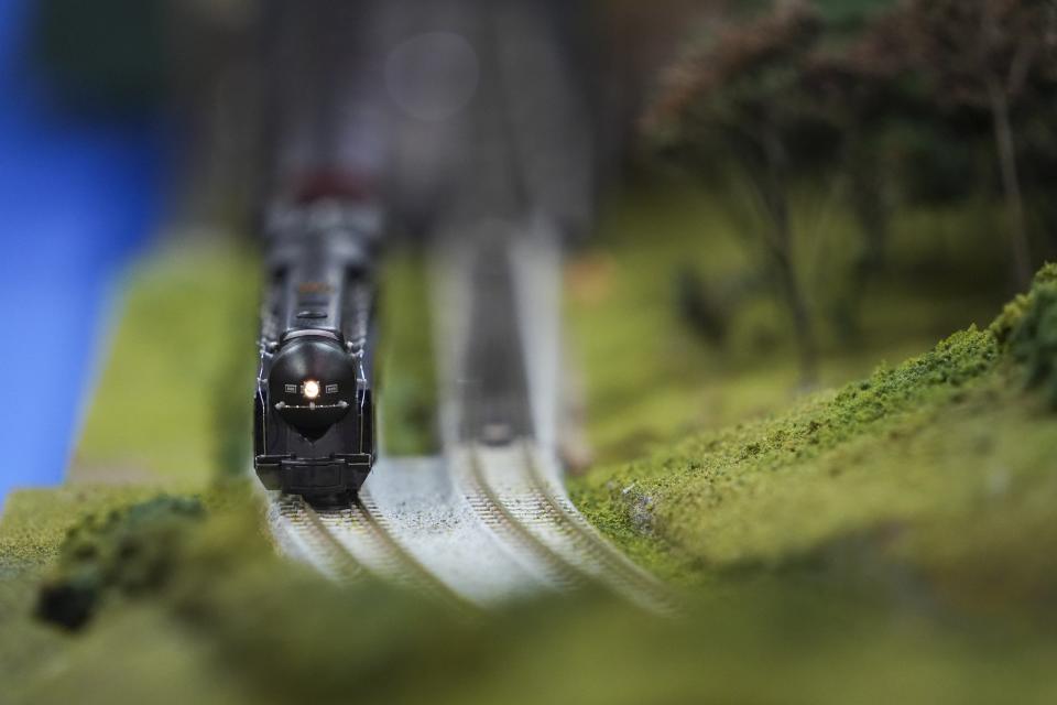 A model train moves along a track on a display at the Great Train Show. The show has been coming to Columbus for at least 30 years and attracts between 3,000 and 4,000 people a year, according to the show manager.