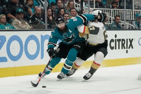 Mar 30, 2019; San Jose, CA, USA; San Jose Sharks defenseman Brent Burns (88) defends against Vegas Golden Knights left wing Max Pacioretty (67) during the second period at SAP Center at San Jose. Mandatory Credit: Stan Szeto-USA TODAY Sports