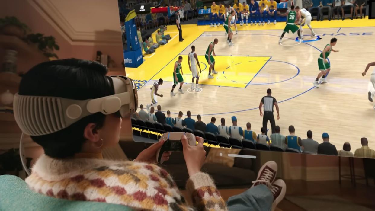  Apple Vision Pro reveal trailer screengrab of someone playing an NBA game with a Sony DualSense controller 