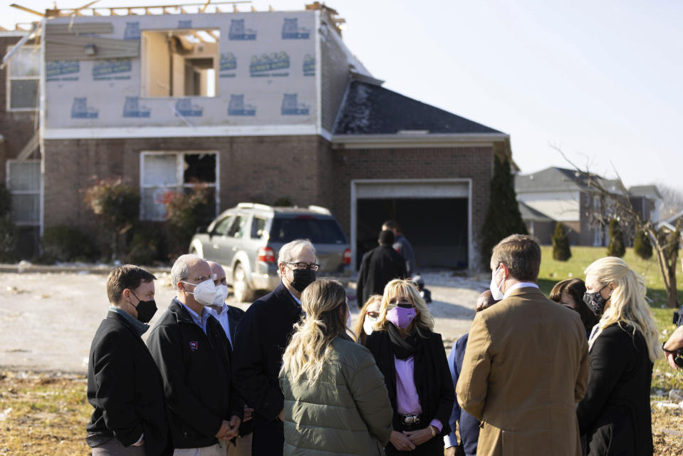 FILE - First lady Jill Biden listens to a resident of the Creekwood neighborhood that was hit by a tornado in Bowling Green, Ky., on Jan. 14, 2022. (AP Photo/Michael Clubb, File)