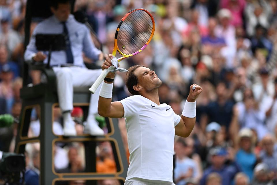 Rafael Nadal (pictured) fist-pumps in celebration after defeating Francisco Cerundolo at Wimbledon. 