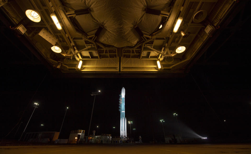 The United Launch Alliance (ULA) Delta II rocket with the NASA Ice, Cloud and land Elevation Satellite-2 (ICESat-2) onboard is seen shortly after the mobile service tower at SLC-2 was rolled back, Saturday, Sept. 15, 2018, at Vandenberg Air Force Base, Calif. The ICESat-2 mission will measure the changing height of Earth's ice. (Bill Ingalls/NASA via AP)