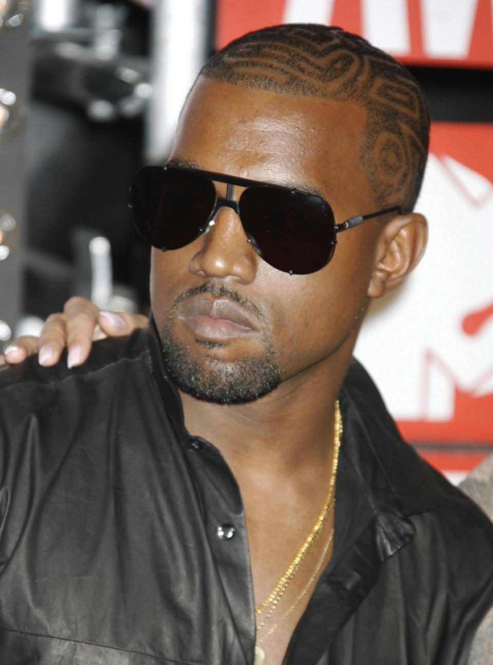 <h1 class="title">Kanye West, 2009</h1><cite class="credit">Photo: Getty Images</cite>