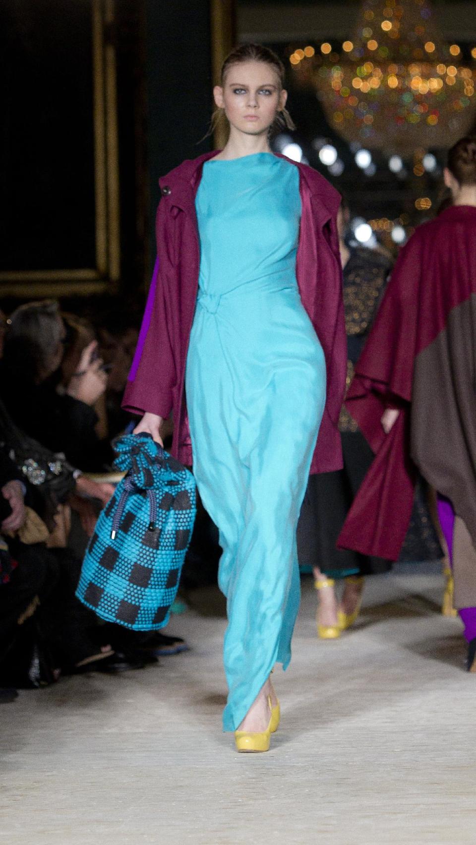 A model wears a creation by designer Roksanda Ilincic during a show at London Fashion Week, Tuesday, Feb. 21, 2012. (AP Photo/Joel Ryan)