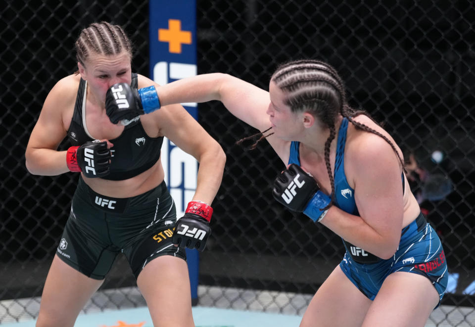 LAS VEGAS, NEVADA – OCTOBER 01: (R-L) Chelsea Chandler punches Julija Stoliarenko of Lithuania in a catchweight fight during the UFC Fight Night event at UFC APEX on October 01, 2022 in Las Vegas, Nevada. (Photo by Jeff Bottari/Zuffa LLC)