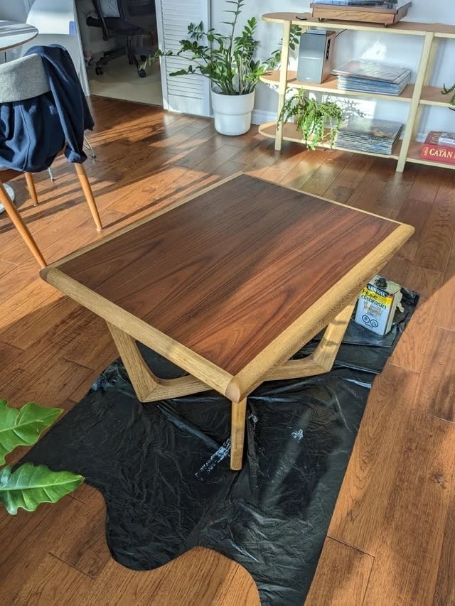 The table after with a light and dark wood stain