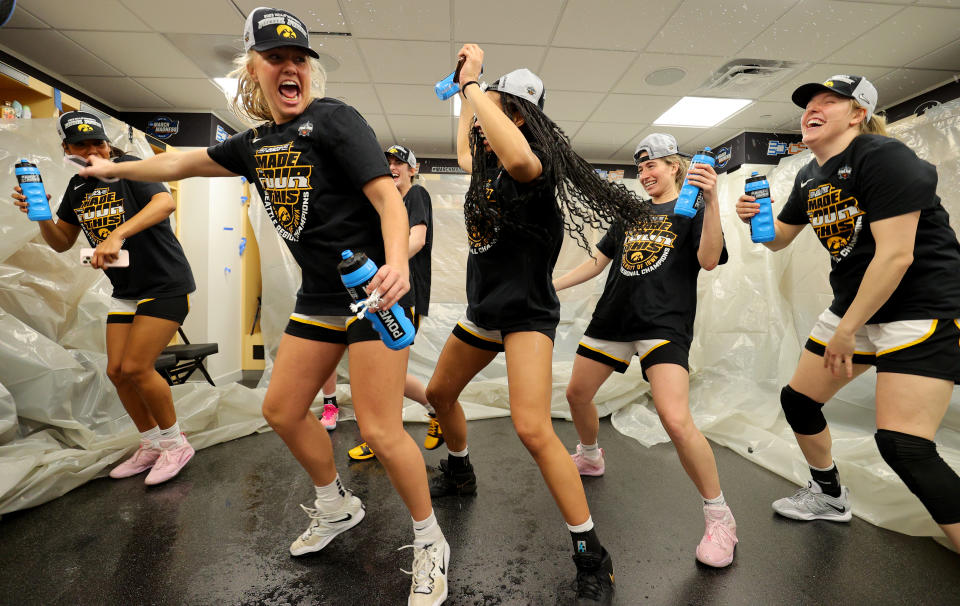 The Iowa Hawkeyes celebrate advancing to the Final Four of the NCAA women's tournament. (C. Morgan Engel/NCAA Photos via Getty Images)