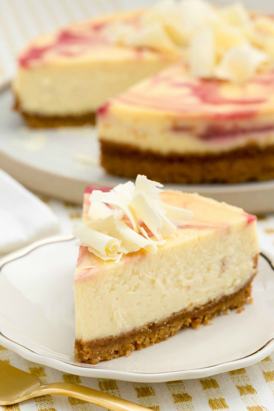 <p>That raspberry swirl is game-changing.</p><p>Get the recipe from <a href="https://www.delish.com/cooking/recipe-ideas/recipes/a45124/white-chocolate-cheesecake-raspberry-swirl-recipe/" rel="nofollow noopener" target="_blank" data-ylk="slk:Delish;elm:context_link;itc:0;sec:content-canvas" class="link ">Delish</a>.</p>