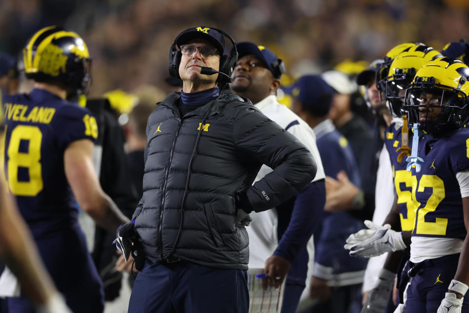 Michigan coach Jim Harbaugh is facing potential punishment from the Big Ten as the conference continues to investigate the program's alleged sign-stealing scheme. (Gregory Shamus/Getty Images)