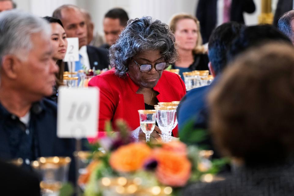 Co-host of the US-Pacific Island Forum Summit U.S. Ambassador to the United Nations Linda Thomas-Greenfield, center, joins delegates during a dinner reception in the Benjamin Franklin Room at the State Department on Monday, Sept. 25, 2023, in Washington.