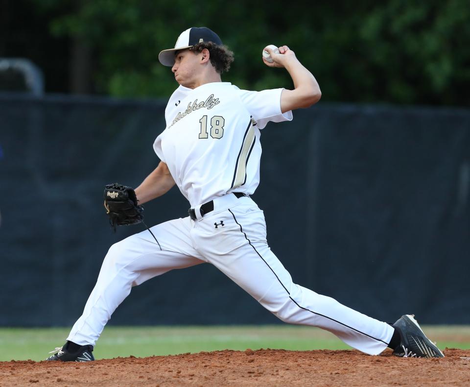 Buchholz High School starting pitcher Ty Robertson (18) throws during a baseball game against Belleview High School held at BHS in Gainesville Fla. April 26, 2022.