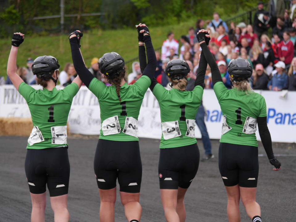 Scenes from the 20Alpha Chi Omega (AXO) start on pole position and walk the track for a parade lap after being introduced