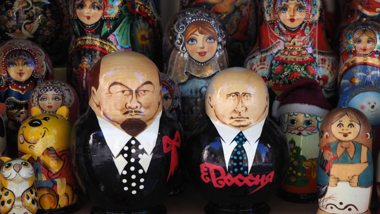  Painted Matryoshka dolls, also known as Russian nesting dolls, depicting Vladimir Lenin and Vladimir Putin. 