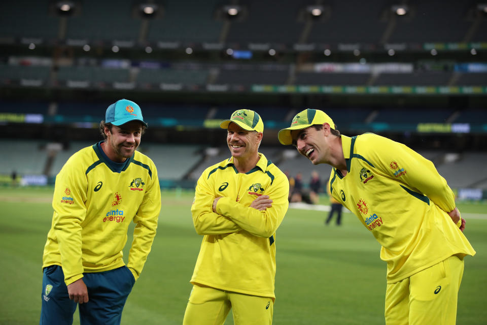 MELBOURNE, AUSTRALIA - NOVEMBER 22: (L-R) Travis Head, David Warner and Pat Cummins of Australia share a joke following game three of the One Day International series between Australia and England at Melbourne Cricket Ground on November 22, 2022 in Melbourne, Australia. (Photo by Graham Denholm - CA/Cricket Australia via Getty Images)