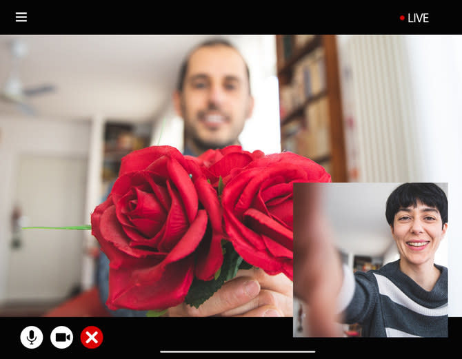 two people video chatting, with one showing roses to the other