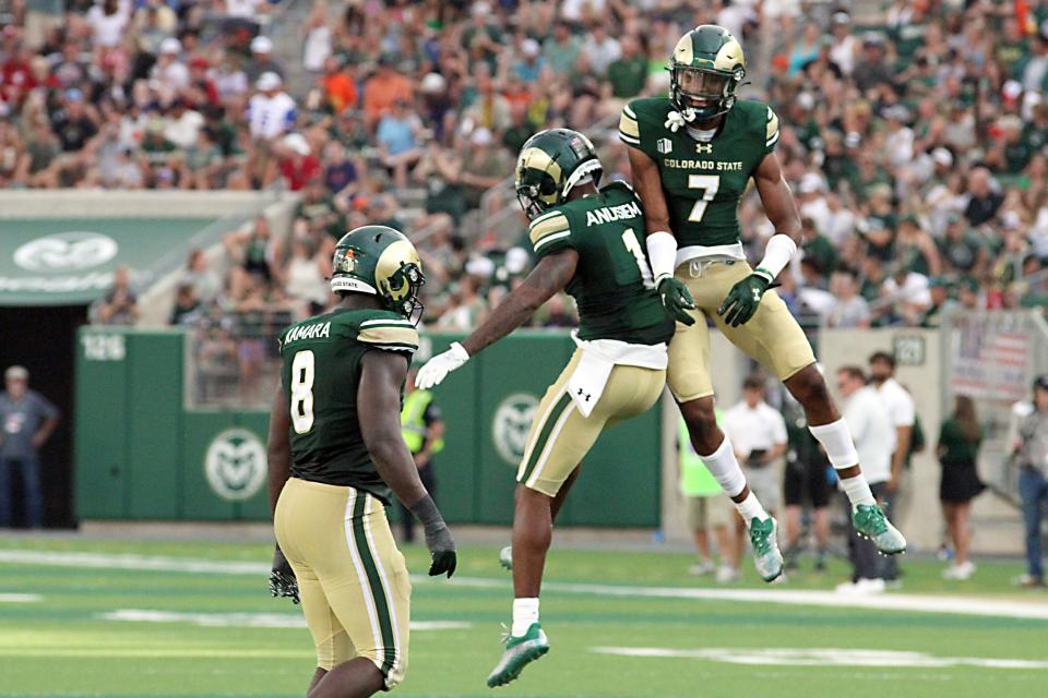 Colorado State defenders Chigozie Anusium (1) and Dom Jones (7) celebrate during the first quarter of the Rams’ first game of the season Saturday, Sept. 2, 2023. The Rams were defeated 50-24.