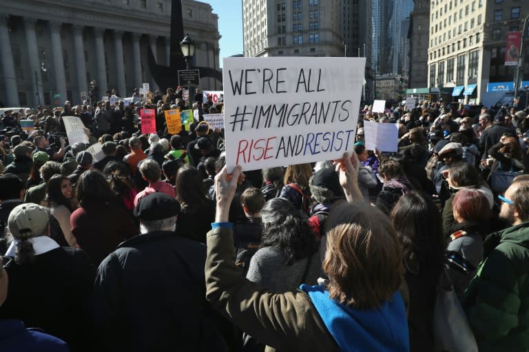 Protesters take part in a Solidarity Rally Against Deportation at Foley Square near the Immigration and Customs Enforcement (ICE) office March 9, 2017 in New York City, supporting immigrant activist Ravi Ragbir as he went for his annual ICE check-in