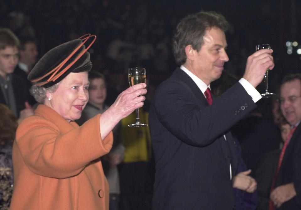 File photo dated 1/1/2001 of the Queen and Blair at the Millennium Dome in Greenwich (PA)