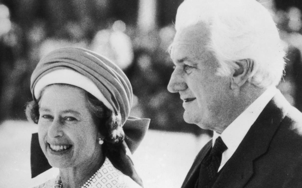 Sir John Kerr, the Governor-General of Australia, escorts Queen Elizabeth II to her aircraft at Perth Airport, following her Jubilee Tour of the country. - Central Press