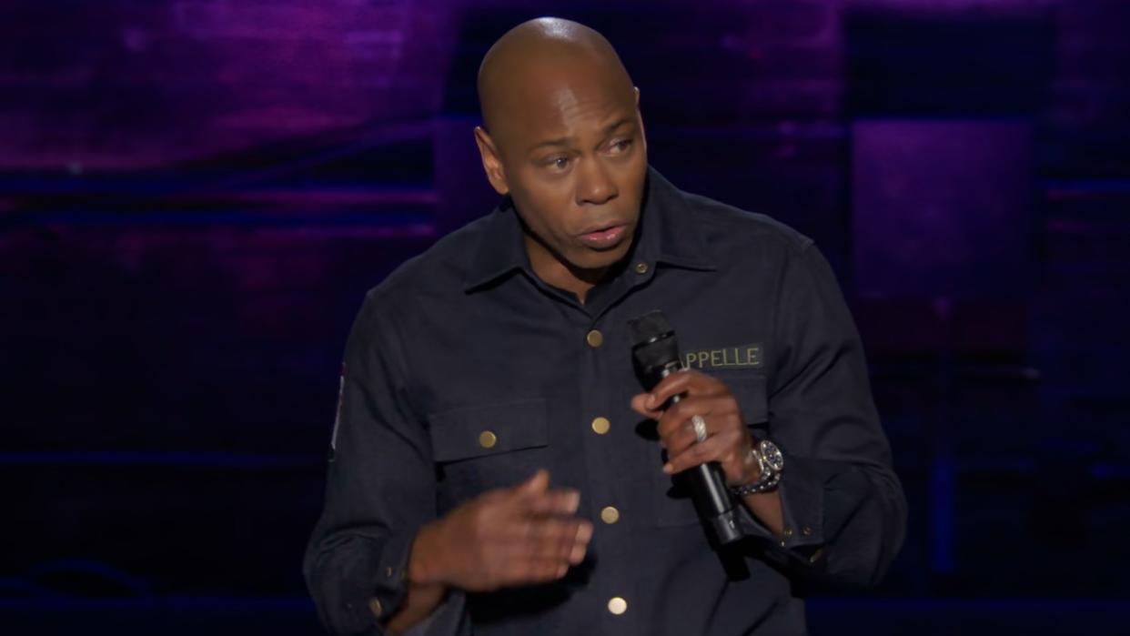  Dave Chappelle doing standup. 