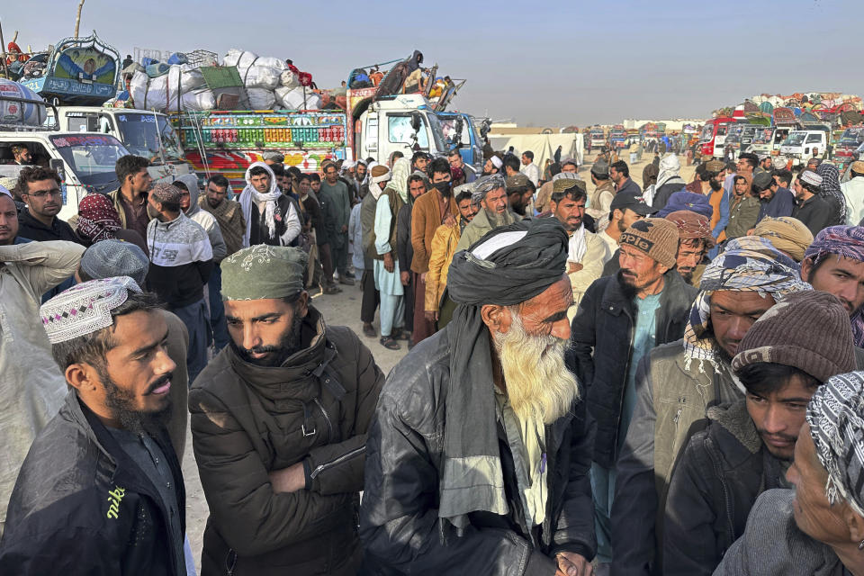 Afghans wait for clearance to depart for their homeland at a deportation camp set up by authorities to facilitate illegal immigrants, in Chaman, a town on the Pakistan-Afghanistan border, Wednesday, Nov. 1, 2023. Pakistani security forces on Wednesday rounded up, detained and deported dozens of Afghans who were living in the country illegally, after a government-set deadline for them to leave expired, authorities said. (AP Photo/Habibullah Achakzai)