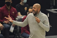 Cleveland Cavaliers head coach J.B. Bickerstaff gives instructions to players in the first half of an NBA basketball game against the Memphis Grizzlies, Monday, Jan. 11, 2021, in Cleveland. (AP Photo/Tony Dejak)