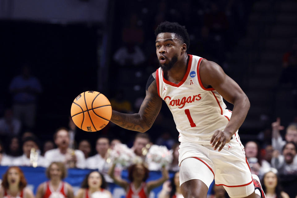 Houston guard Jamal Shead brings the ball up during the first half of the team's first-round college basketball game against Northern Kentucky in the men's NCAA Tournament in Birmingham, Ala., Thursday, March 16, 2023. (AP Photo/Butch Dill)