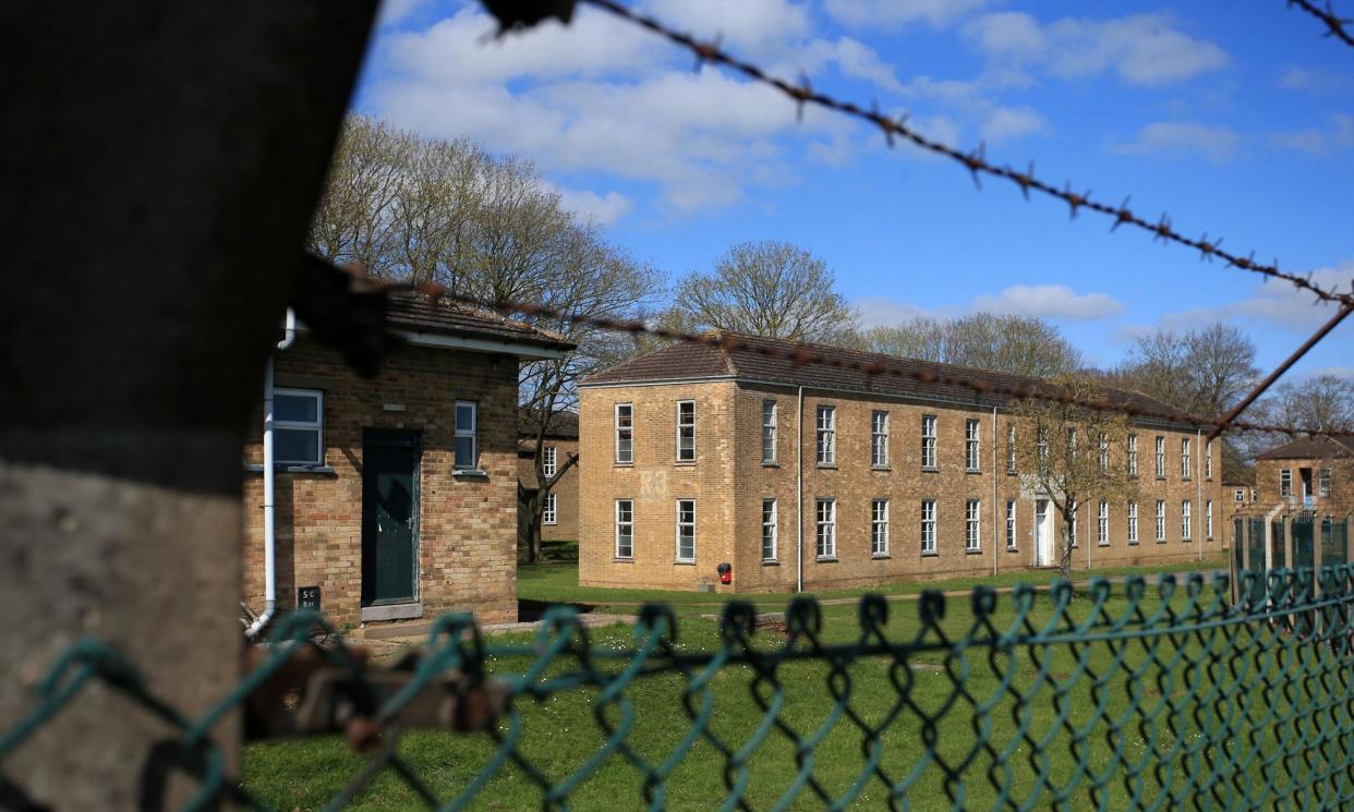<span>RAF Scampton, one of several alternate housing options for asylum seekers, would cost £45.1m more than keeping them in hotels. </span><span>Photograph: Lindsey Parnaby/AFP/Getty Images</span>