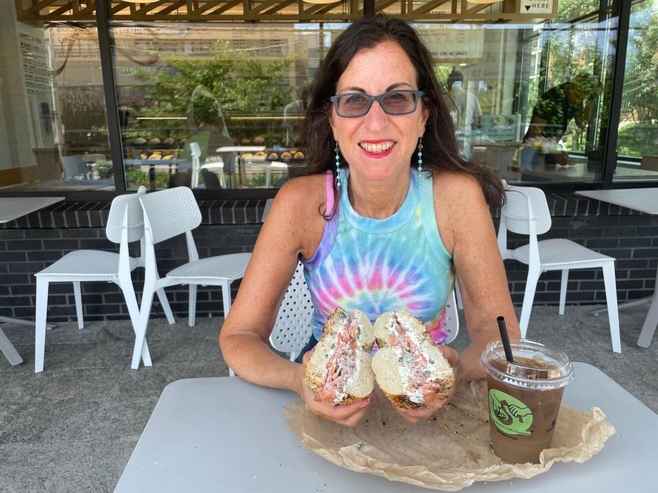 Lohud Food & Dining Reporter Jeanne Muchnick with an everything bagel with pastrami nova at Brooklyn Bagel Company in Mamaroneck. The pastrami nova is Muchnick's "best thing" she ate this week. Photographed July 2024