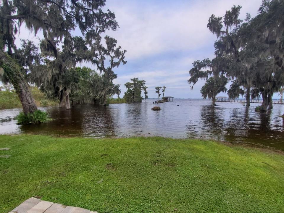 Crescent Lake overflowed across Flagler County Sheriff Rick Staly's property in western Flagler County. Staly said that Crescent Lake exceeded its bank by about 250 feet. Water covered 12 feet of the dock.