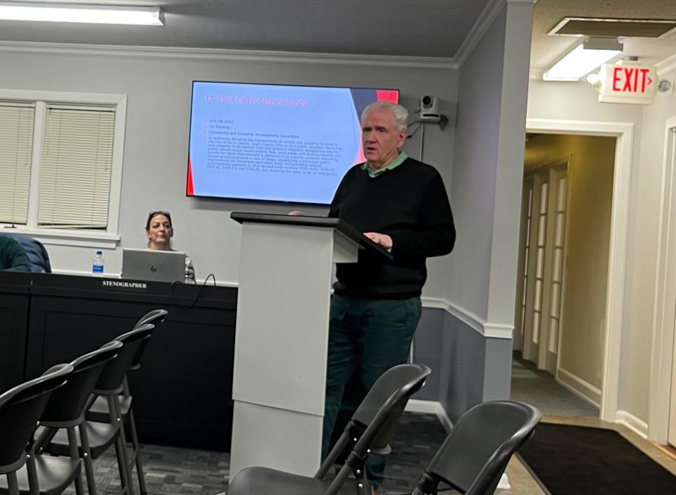 North Canton Director of Administration Patrick DeOrio briefs North Canton Council Monday evening on the terms of an tax incentive finance agreement between the city and Hoover District developers.