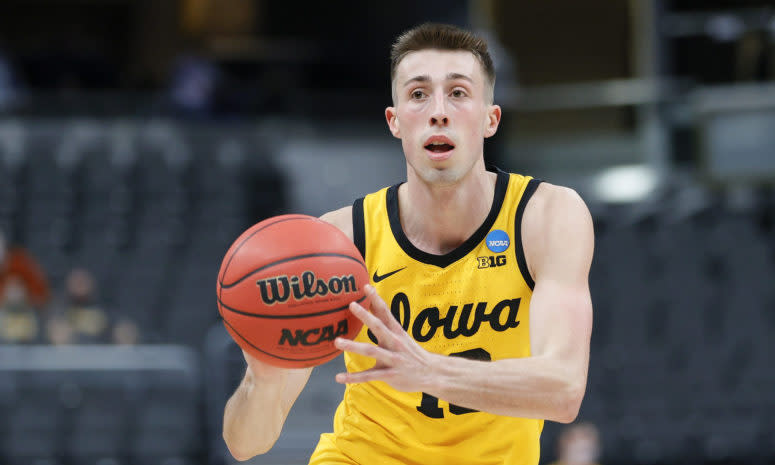 Joe Wieskamp #10 of the Iowa Hawkeyes handles the ball