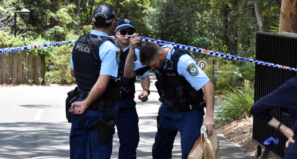 A second Scientology member was injured. NSW Police are pictured here on the scene at Chatswood. Source: AAP