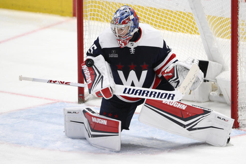 Washington Capitals goaltender Darcy Kuemper (35) stops the puck during the third period of an NHL hockey game against the Montreal Canadiens, Tuesday, Feb. 6, 2024, in Washington. The Canadiens won 5-2. (AP Photo/Nick Wass)