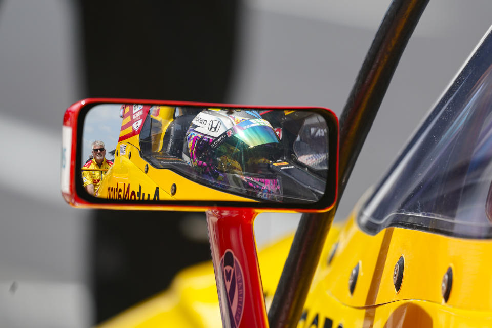 Romain Grosjean, of France, waits as they start his car during practice for the Indianapolis 500 auto race at Indianapolis Motor Speedway in Indianapolis, Thursday, May 19, 2022. (AP Photo/Michael Conroy)