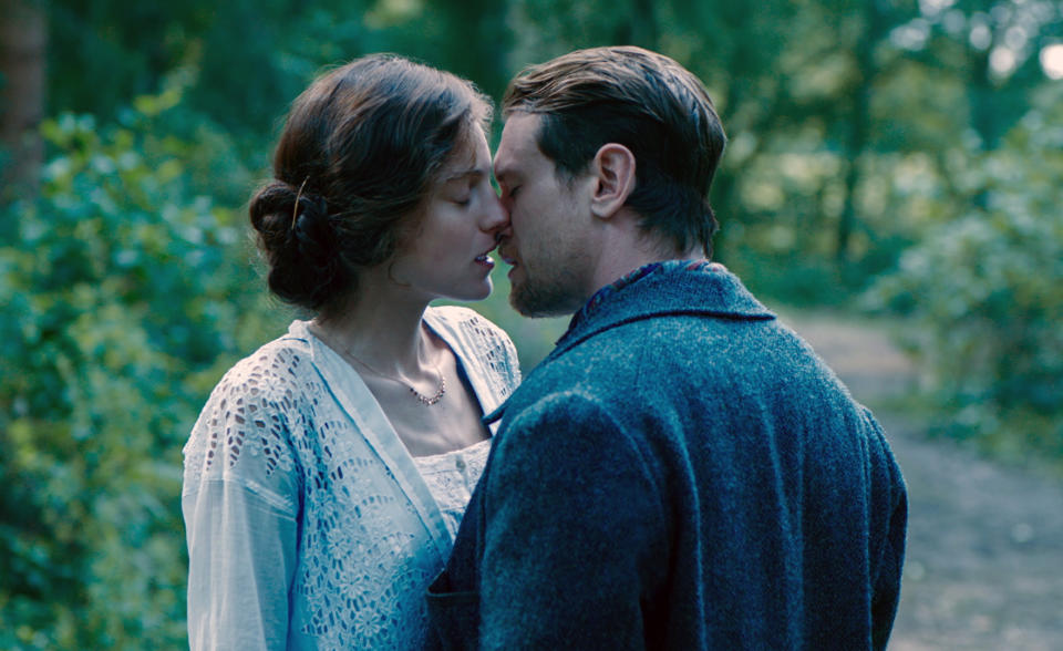 This image released by Netflix shows Emma Corrin, left, and Jack O'Connell in a scene from "Lady Chatterley's Lover." (Netflix via AP)