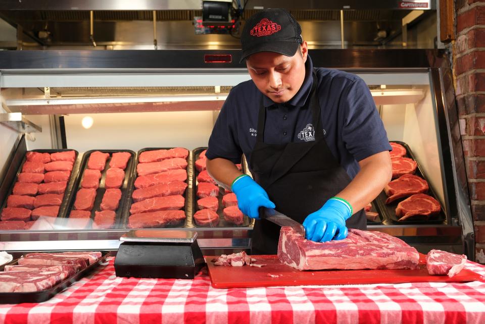 Texas Roadhouse employee and National Meat Cutting Challenge finalist Silvano Vicente cuts properly sized steaks by sight and feel.