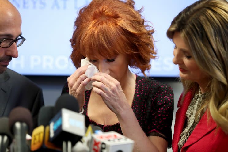 Kathy Griffin, center, and her attorney, Lisa Bloom, speak during a press conference at The Bloom Firm on June 2, 2017, in Woodland Hills, Calif. Griffin held the press conference after a controversial photoshoot — in which she held a bloodied mask of President Trump — to address alleged bullying by the Trump family. (Photo by Frederick M. Brown/Getty Images)