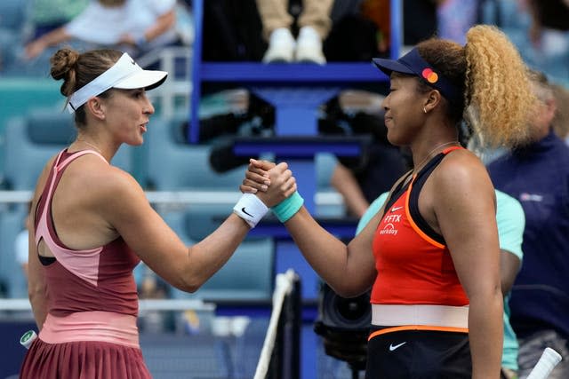 Naomi Osaka, right, claimed an emotional win over Belinda Bencic